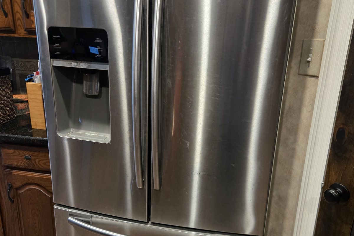 Stainless French-door refrigerator in a customer kitchen
